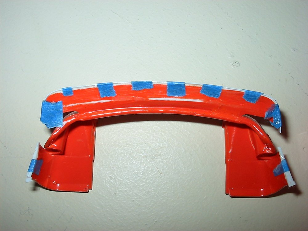 Filler and bodywork on a panel