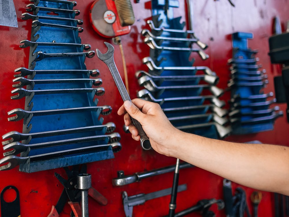 Tools laid out on a workshop wall